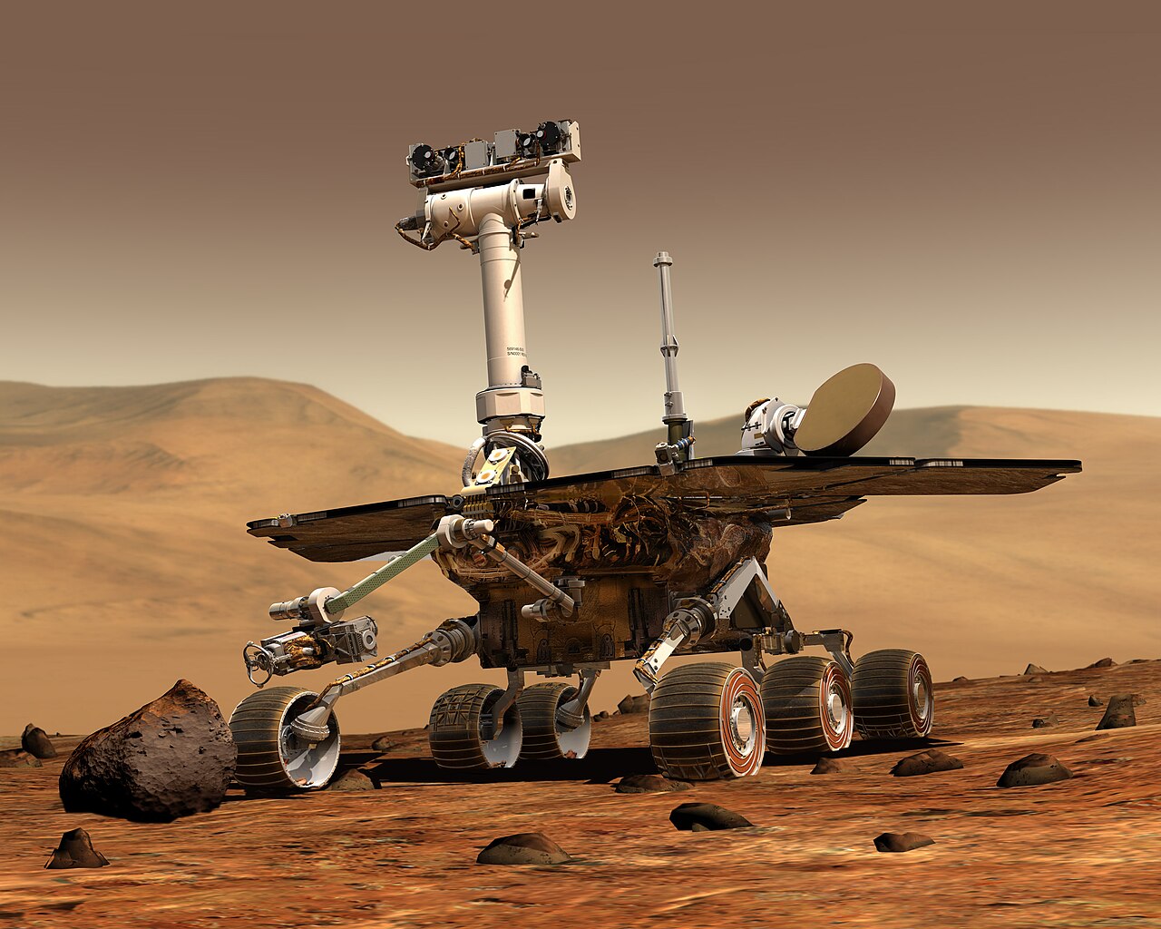 A NASA Mars Exploration Rover on the rusty Martian surface.