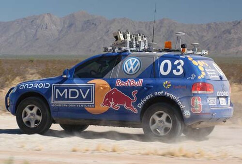 Stanley, a sand-colored Volkswagen Touareg with roof-mounted laser scanners, the driverless car that won the 2005 DARPA Grand Challenge.